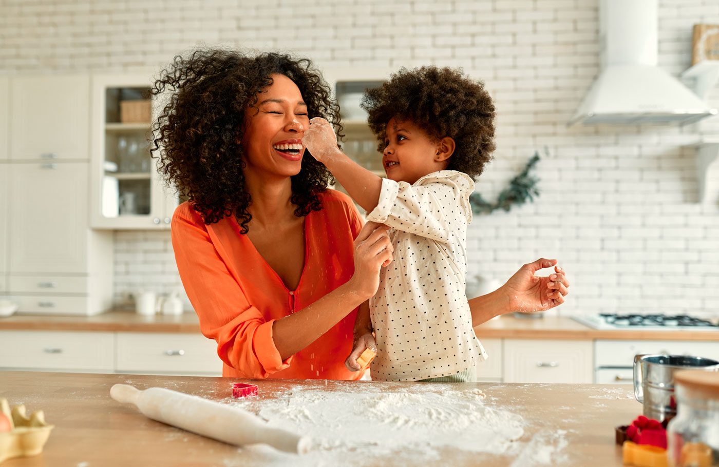 african american family at home with home insurance