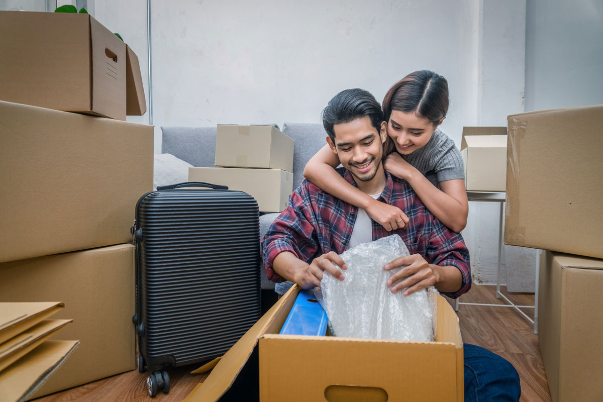 asian young couple with new home insurance