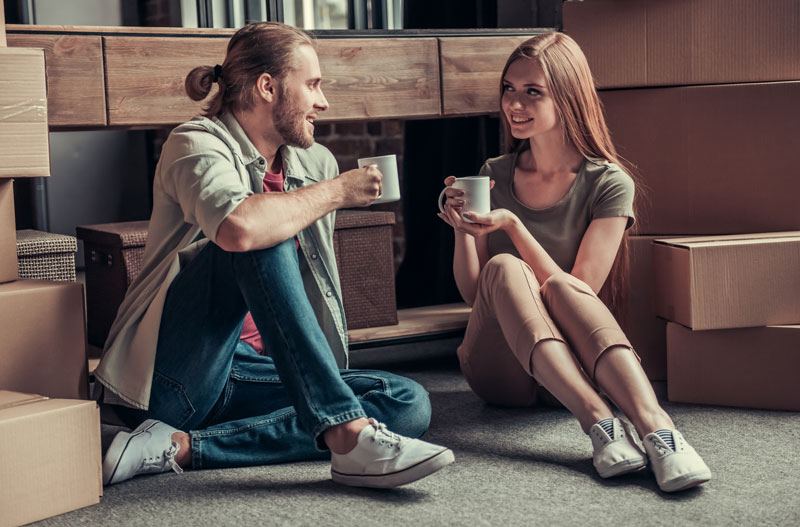younh couple talking about health insurance